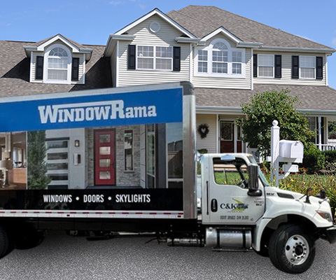 Exterior of a home with a WindowRama truck parked in front